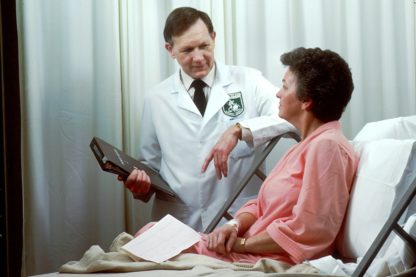 Doctor listening to a patient during a consultation